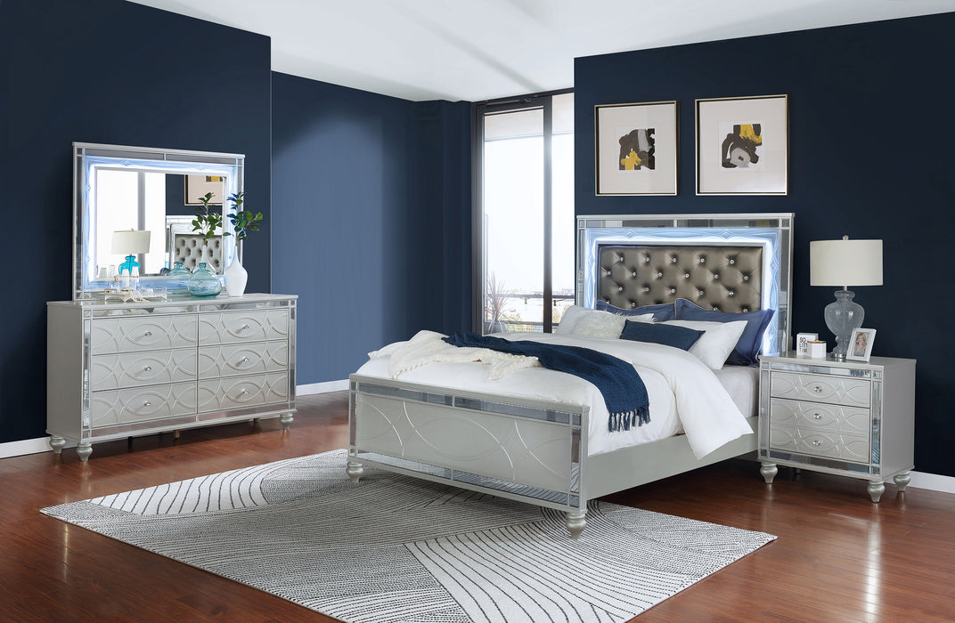 CoasterEssence Gunnison 4-piece Eastern King bedroom set in silver metallic finish, featuring a bed frame, nightstands, and dresser.