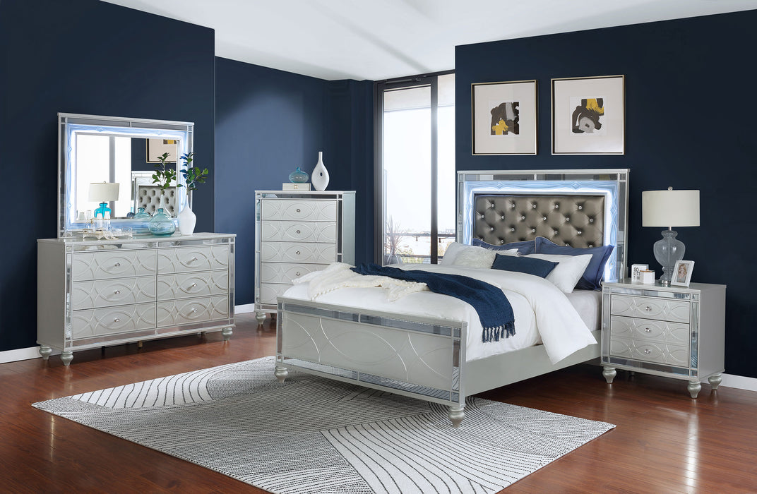 CoasterEssence Gunnison 5-piece Queen bedroom set in silver metallic finish, includes bed frame and matching furniture pieces.