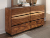 Winslow 6-drawer dresser in smokey walnut wood with sleek metal handles, showcasing modern bedroom furniture design.