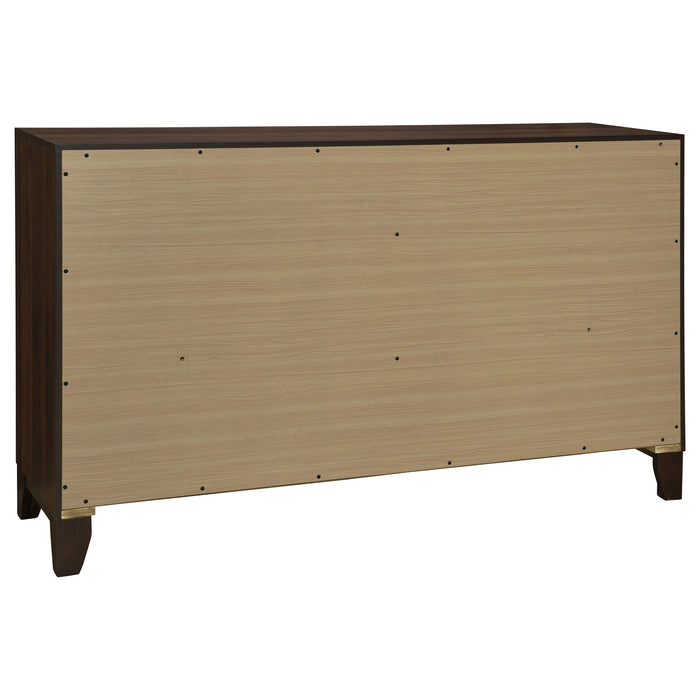 Welsley 4-piece California King bedroom set by CoasterEveryday in walnut finish, includes bed frame, dresser, mirror, and nightstands.