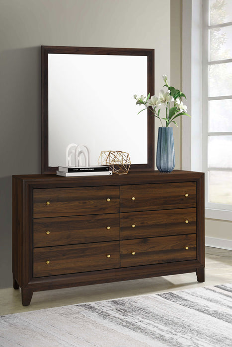 Walnut Welsley 6-drawer dresser with matching mirror, wooden furniture piece with sleek handles and a polished finish.