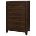 Walnut Welsley 4-drawer chest of drawers from CoasterEveryday, showcasing a sleek furniture piece with four spacious drawers.