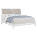 White upholstered 56-inch Eastern king panel bed from CoasterEveryday, showcasing a modern furniture design with clean lines.