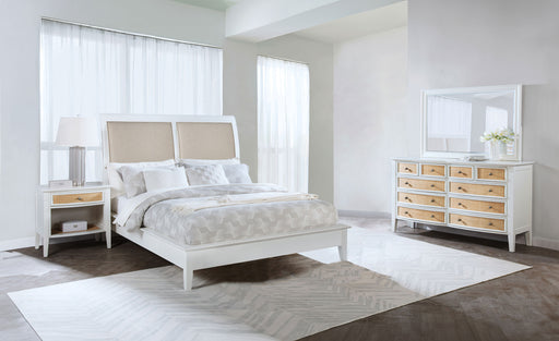 White Bexhill 4-piece Queen bedroom set by CoasterEveryday, including bed frame, nightstands, and dresser, shown in a modern bedroom setting.