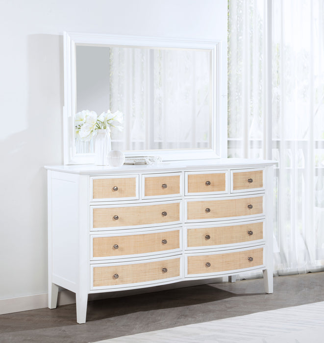 White Bexhill 10-drawer dresser with matching mirror, made of wood with sleek handles and a spacious top surface.