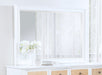 White Bexhill dresser mirror from CoasterEveryday, showing a sleek rectangular frame and clear reflective glass on a furniture piece.