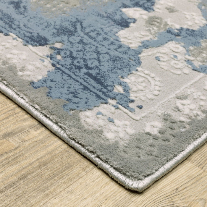 6.6' x 9.5' Abstract Power Loom Stain Resistant Area Rug - Grey Blue Ivory Navy Beige And Brown
