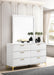 White Kendall 6-drawer dresser with attached mirror, modern furniture piece with sleek handles and a smooth finish.