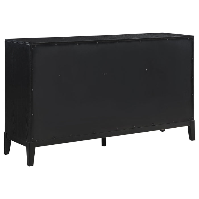 Brookmead 4-piece upholstered Eastern King bedroom set in black, featuring a bed frame, headboard, and matching furniture pieces.