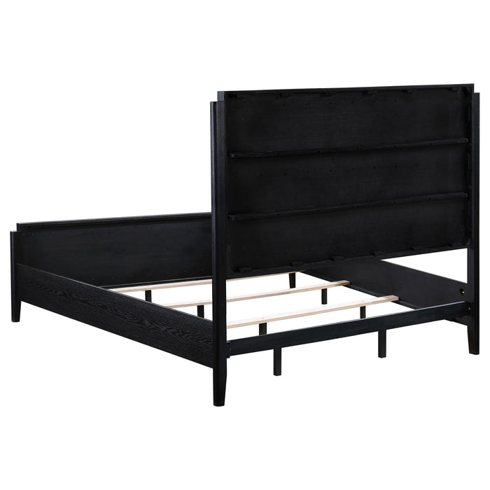 Black Brookmead 5-piece upholstered Eastern King bedroom set by CoasterEveryday, including bed frame and matching furniture pieces.