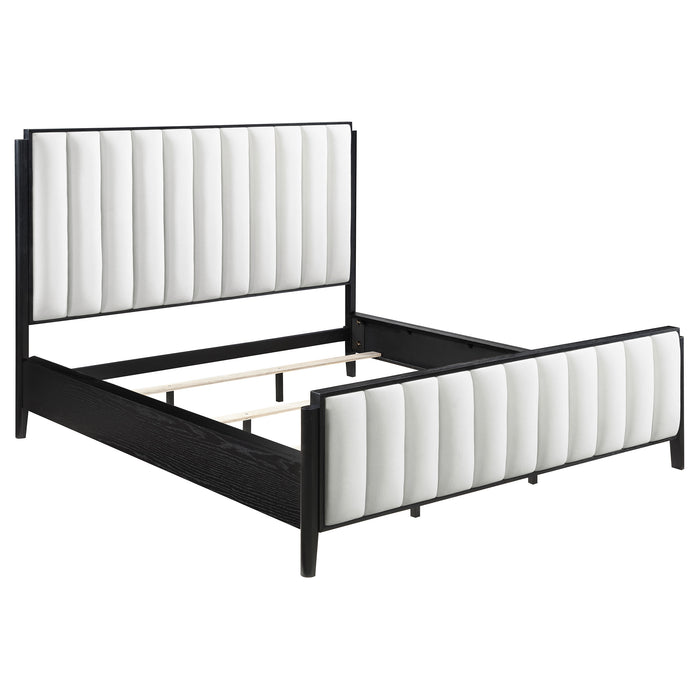 Brookmead black 4-piece Cal King upholstered bedroom set by CoasterEveryday, including bed frame, headboard, and matching furniture pieces.