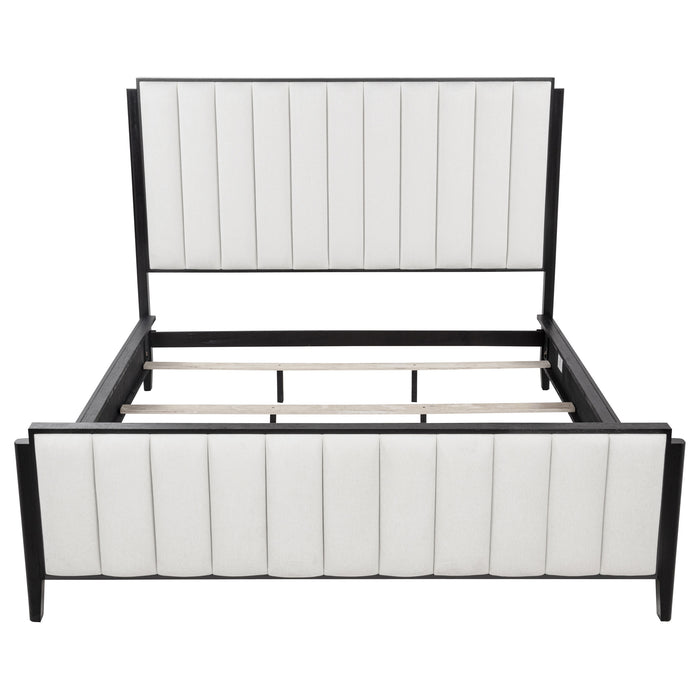 Black upholstered California king bed from the Brookmead collection by CoasterEveryday, featuring a plush headboard and sleek frame.