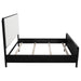 Black upholstered California King bed from Brookmead, featuring a modern furniture design with a sturdy frame and plush headboard.