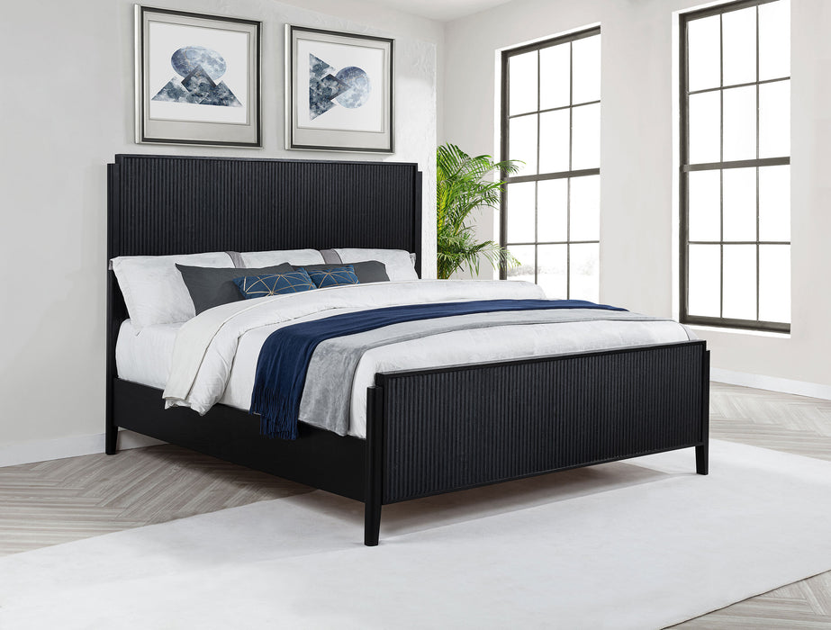 Black California King panel bed from Brookmead Wood by CoasterEveryday, showing the sleek wood-finished headboard and frame.