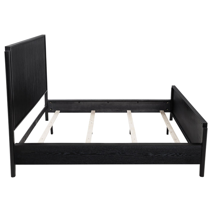 Black California King panel bed by CoasterEveryday with a sleek wood finish, showcasing the elegant furniture design.
