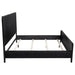 Black California King panel bed by CoasterEveryday with a sleek wood finish, showcasing the elegant furniture design.