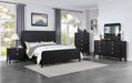 California King panel bed by CoasterEveryday with a black wood finish, featuring a sleek and modern furniture design.