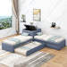 Giga L-shaped upholstered platform bed with built-in desk, trundle, and two drawers for versatile sleeping and workspace.