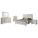 Olivia 5-piece California King bedroom set in elegant pearl white with a modern design and matching headboard and storage drawers.