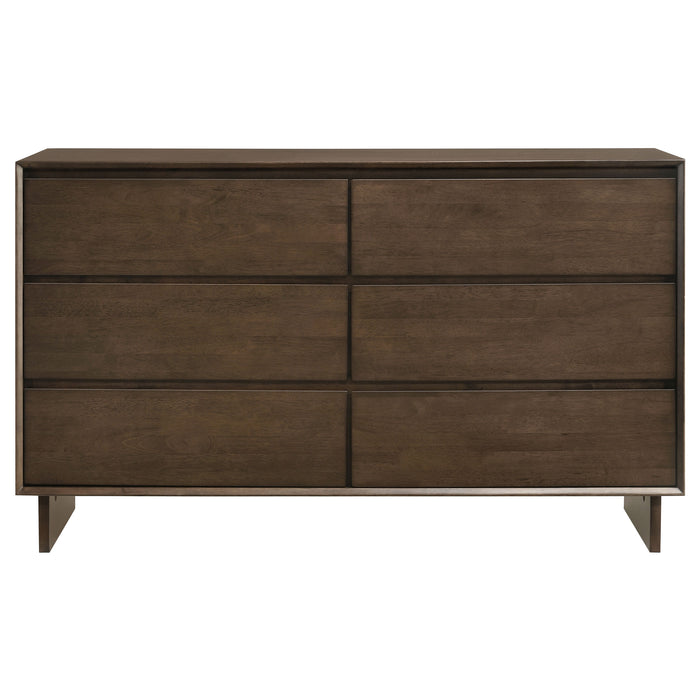 CoasterEveryday Glenwood 6-drawer dresser in warm brown wood finish, showing the furniture with sleek drawer handles and modern design.
