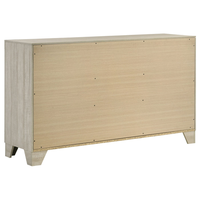 Rustic cream CoasterEveryday Trenton 4-piece Eastern King bedroom furniture set with bed, nightstands, and dresser, in a cozy rustic style.