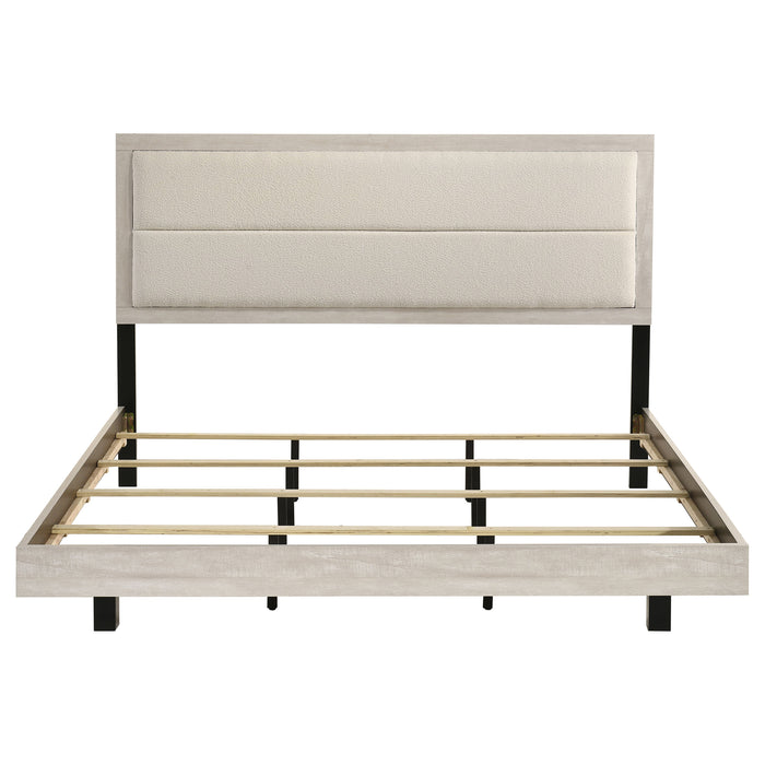 Rustic cream wood Eastern King panel bed from CoasterEveryday with 54-inch height and classic design, shown in a bedroom setting.
