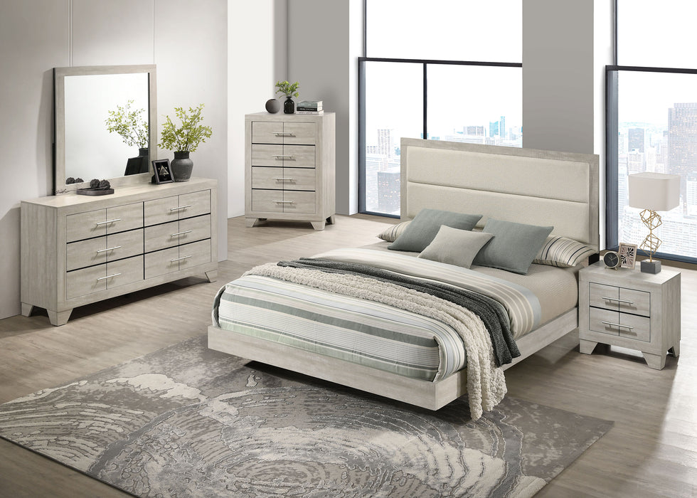 Rustic cream CoasterEveryday Trenton 2-drawer nightstand with wooden finish and metal handles, showcasing its bedside table design.
