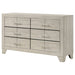 Rustic cream CoasterEveryday Trenton 6-drawer bedroom dresser with metal handles and wood grain finish, showcasing its spacious design.