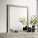 Rustic cream Trenton dresser mirror by CoasterEveryday, featuring a large rectangular mirror with a wooden frame.