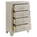Rustic cream Trenton 4-drawer bedroom chest of drawers by CoasterEveryday, showcasing a wooden furniture piece with metal handles.