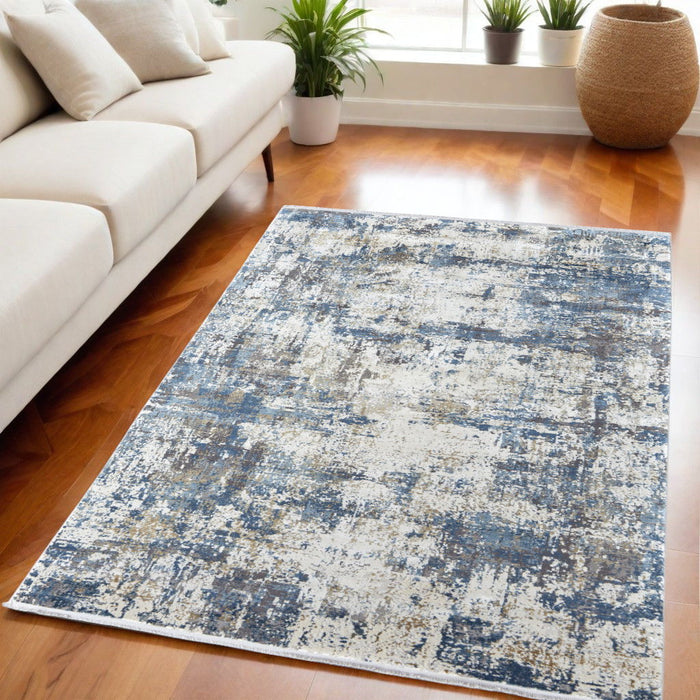 5' X 8' Abstract Power Loom Area Rug With Fringe - Ivory