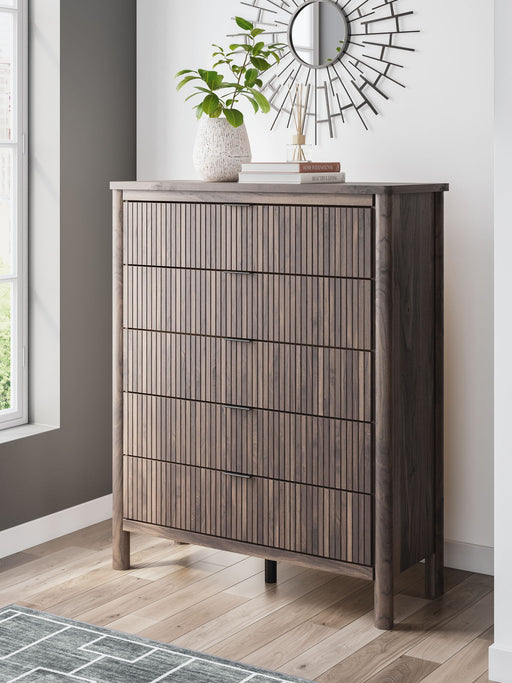 Brown Pamytta Five Drawer Wide Accent Chest by Signature Design by Ashley® with sleek wood finish and spacious storage drawers.