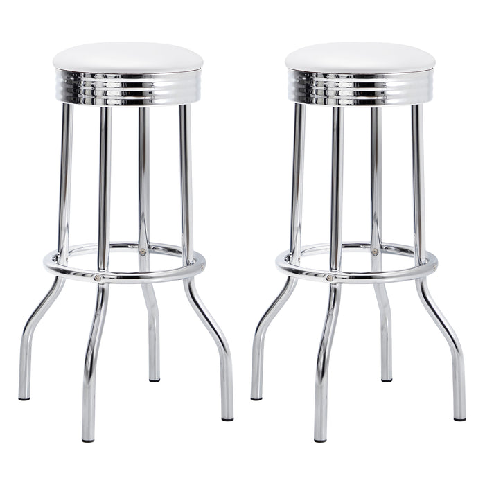 Pair of white retro upholstered metal swivel bar stools with wooden footrests, designed for modern kitchen or bar areas.