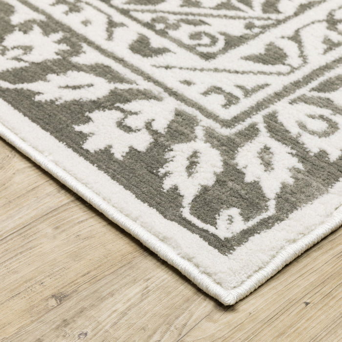 8' x 11' Oriental Power Loom Stain Resistant Area Rug - Gray And White
