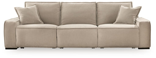 Benchcraft® Carceri 3-piece power sectional sofa with armless recliner in cashmere fabric, featuring reclining seats and plush cushions.