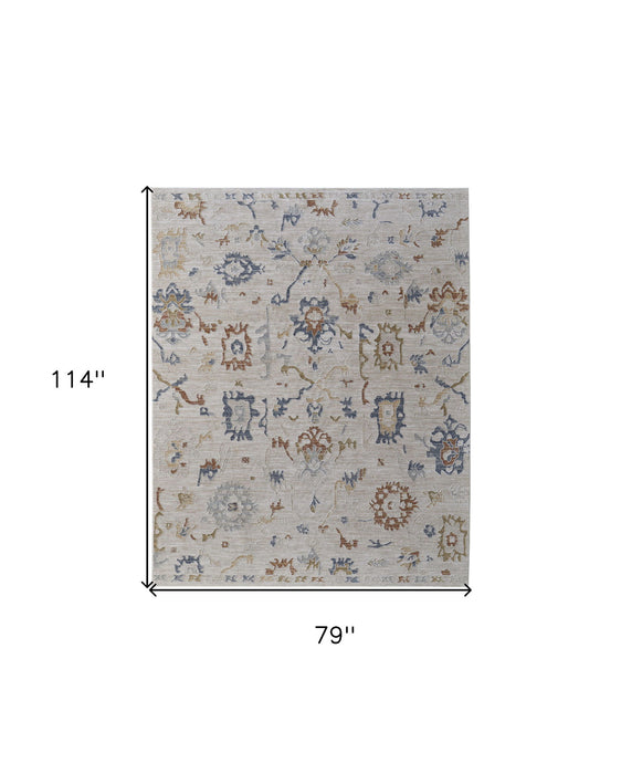 7' x 10' Floral Power Loom Worn Faded Area Rug With Fringe - Ivory Blue And Gold