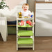 Giga multifunctional highchair for toddlers with adjustable height and 5-point harness, featuring a comfortable seat and safety straps.