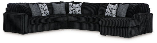 Signature Design by Ashley® Midnight-Madness 4-piece stationary sectional sofa with plush cushions and modern design.