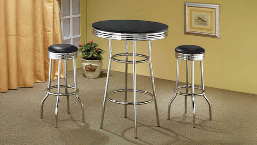 Retro 3-piece round 1950s bistro pub bar table set in black, featuring vintage-style furniture with sturdy metal legs.