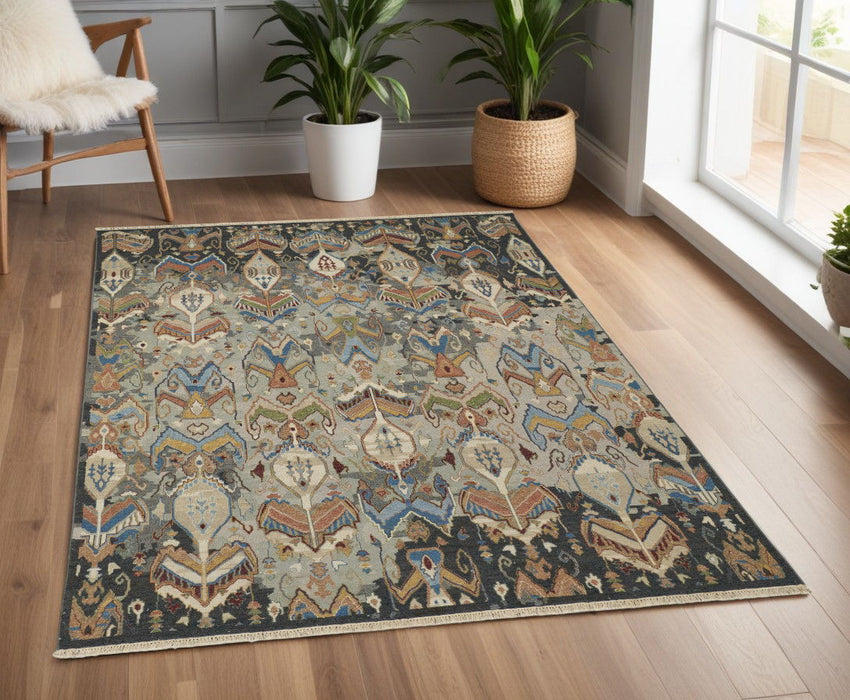 3.5' x 5.5' Wool Ikat Hand Knotted Area Rug With Fringe - Blue Gray And Brown