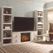 Signature Design by Ashley Willowton entertainment center with fireplace option, featuring wood finish and spacious storage compartments.