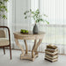 Giga farmhouse style small round side table with curved legs, natural distressed wood grain, ideal for living or dining room.