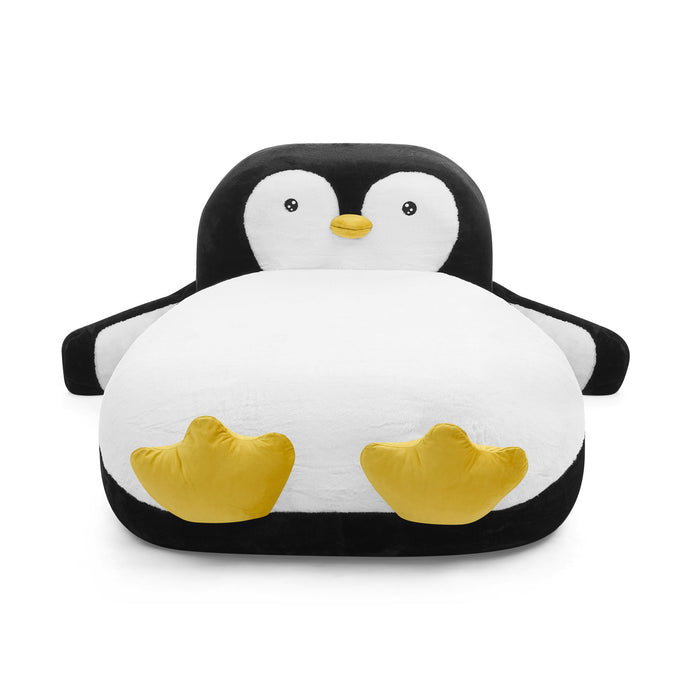 White and black twin size penguin-shaped upholstered bed by Giga, designed as a cozy kids' bedroom lounger chair.