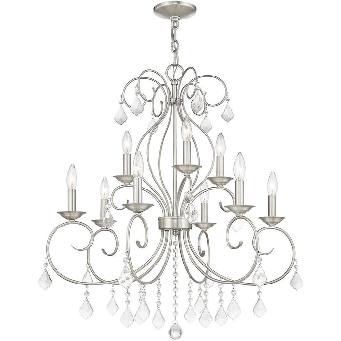 Nine light metal chandelier with clear shades in a nickel finish, dimmable design by HomeRoots, hanging fixture for modern interiors.