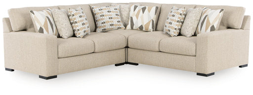 Benchcraft Laurelgrove 3-piece stationary sectional sofa set with plush cushions and modern design, shown in a stylish living room setting.