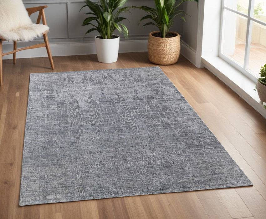 4' x 6' Casual Abstract Hand Woven Worn Faded Wool Blend Area Rug - Gray