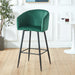 Set of 2 Giga black and green velvet upholstered counter height bar stools with metal legs for pub, restaurant, or kitchen island.