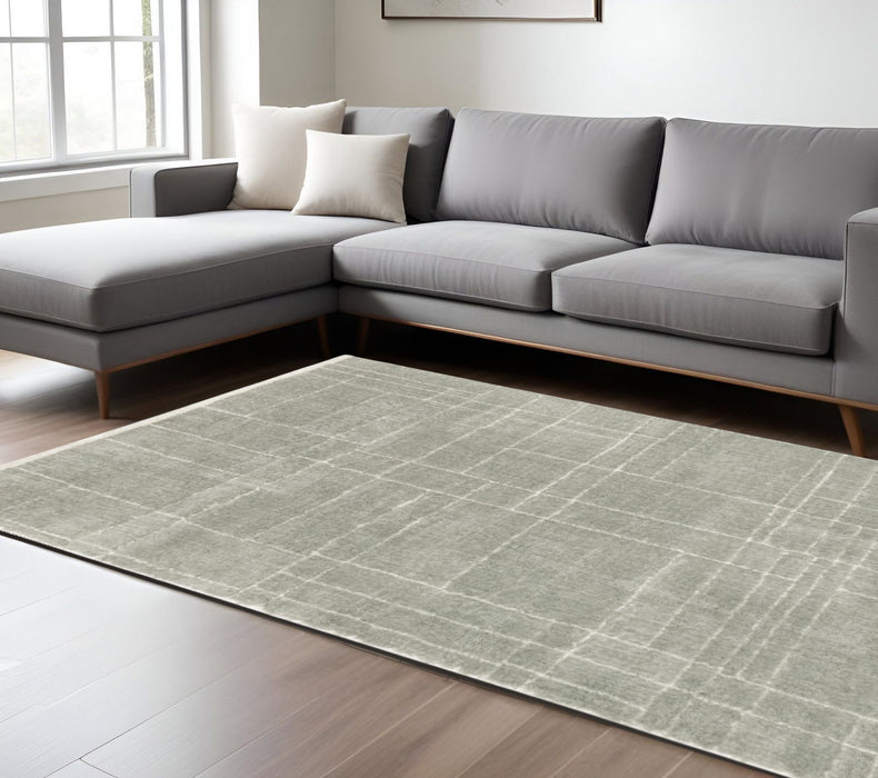 7.9' x 10.8' Geometric Shag Power Loom Stain Resistant Area Rug - Grey And Ivory