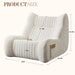 Giga white adult bean bag chair with soft chenille fabric, cozy floor sofa and lounge reading chair in a living room setting