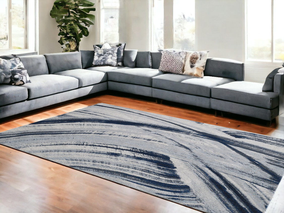 8' x 11' Abstract Polypropylene Area Rug - Ivory And Blue